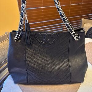 Tory Burch Fleming Distressed Tote
Color Black with silver chain straps.